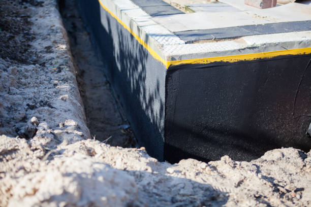 Professional Foundation Crack Repair technician working in Oakwood, IL